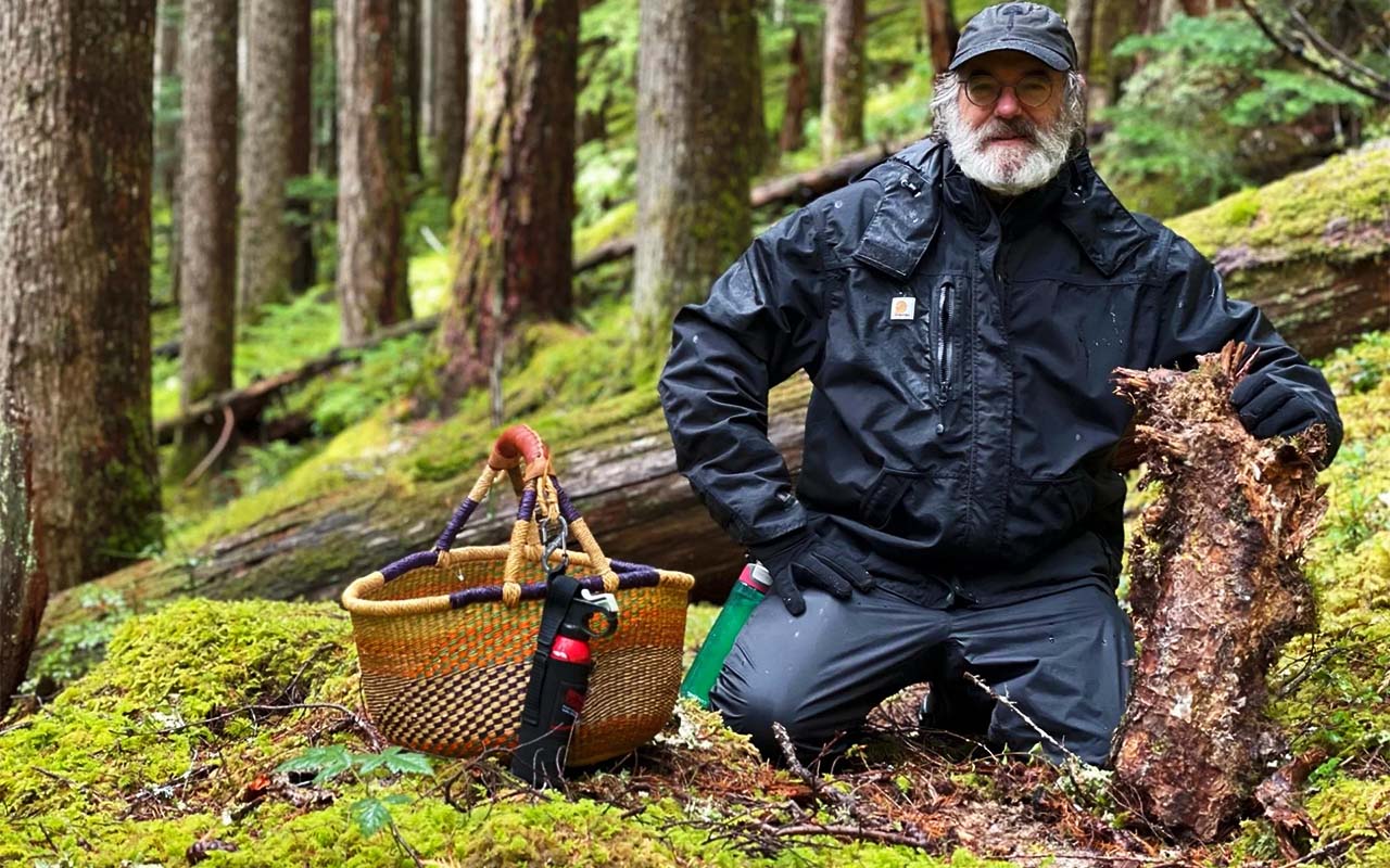 Paul Stemec in the forest with a basket